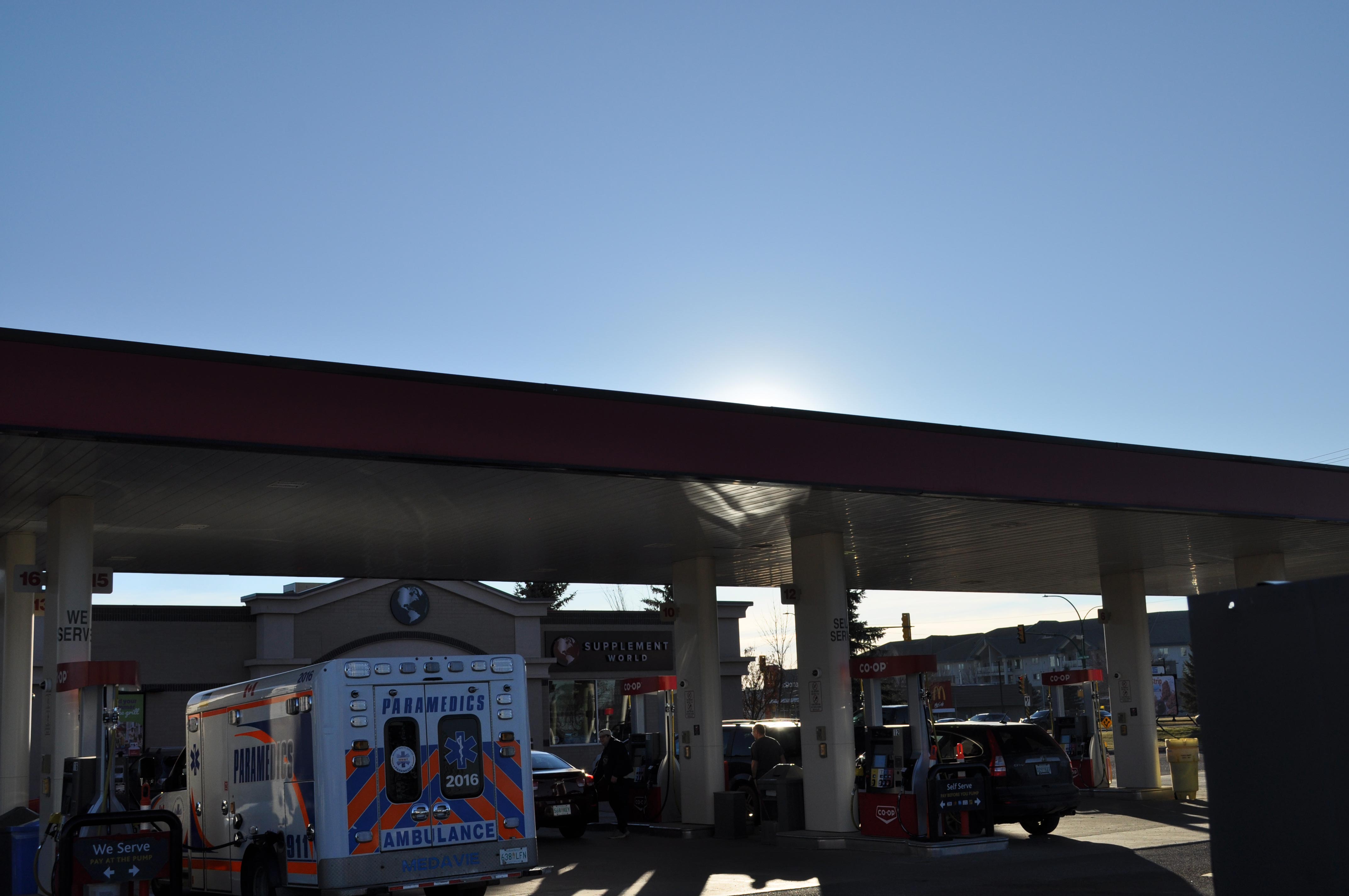 Gas station blocking the sunlight to create a silhouette